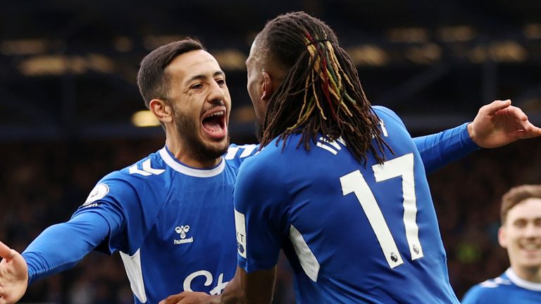 Dwight McNeil celebrates his goal with team-mate Alex Iwobi