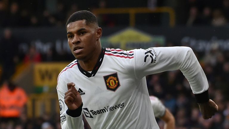 Manchester United&#39;s Marcus Rashford celebrates after scoring his side&#39;s opening goal during the English Premier League soccer match between Wolverhampton Wanderers and Manchester United at the Molineux Stadium in Wolverhampton, England, Saturday, Dec. 31, 2022. (AP Photo/Rui Vieira)