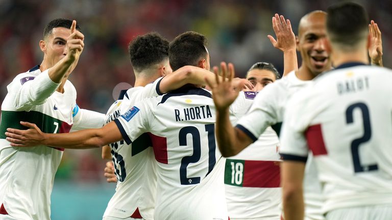 Portugal players celebrate after scoring inside three minutes