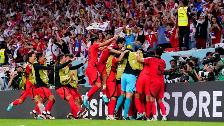 South Korea players celebrate after Hee-Chan Hwang scores their match-winning goal