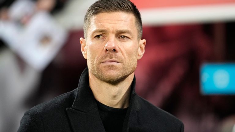 Leverkusen's head coach Xabi Alonso concentrates prior the start of the German Bundesliga soccer match between Bayer Leverkusen and VfL Bochum at the BayArena in Leverkusen, Germany, Wednesday, Dec. 20, 2023. (AP Photo/Martin Meissner)