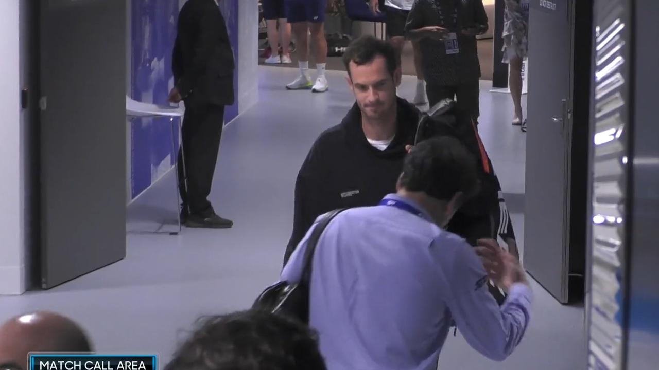 Andy Murray was spotted back at Melbourne Park before midday after his past-4am finish, with an unknown man giving him a little bow as he walked past.