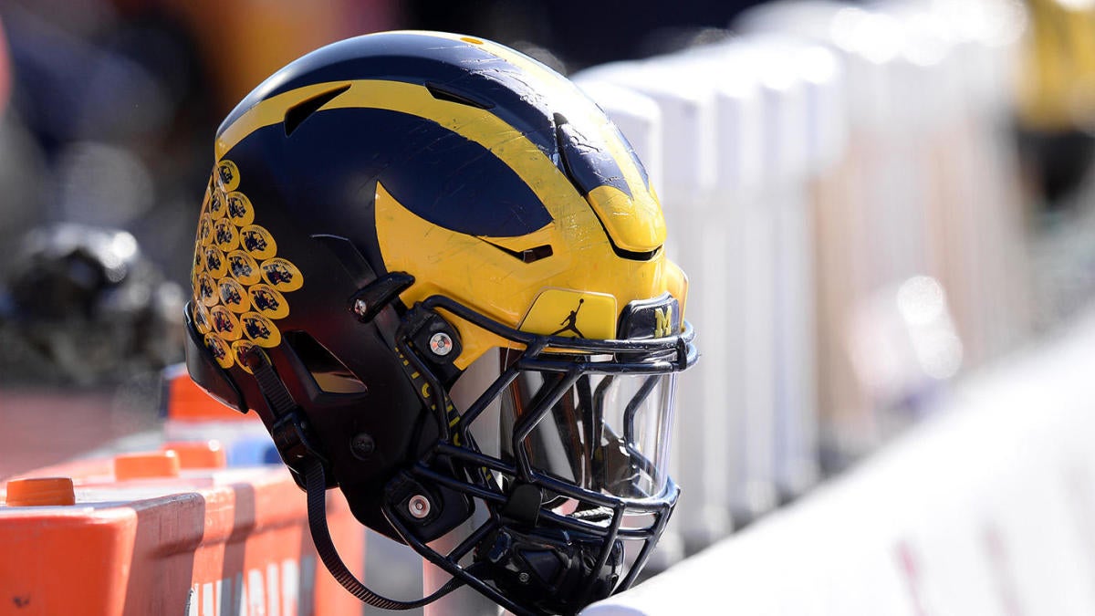 Michigan assistant Mike Hart carted off field after collapsing on sideline during game vs. Indiana