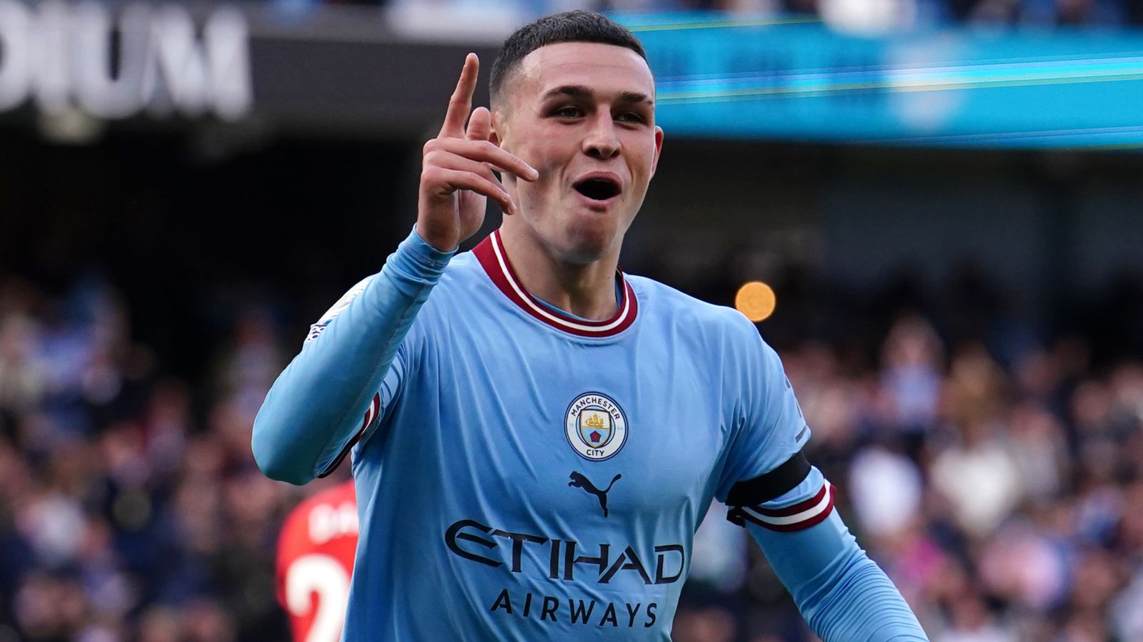 Phil Foden celebrates scoring his second goal, Man City's fourth