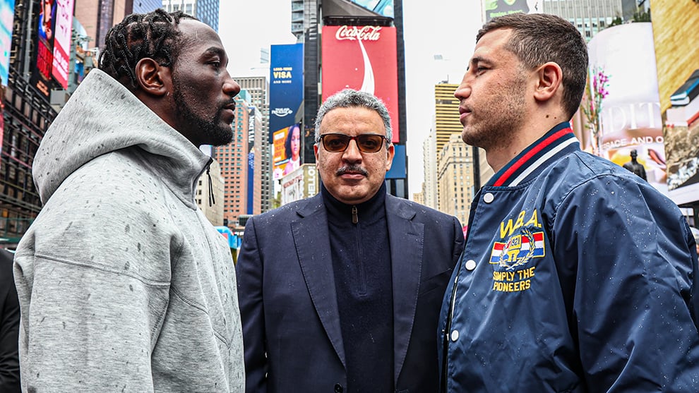 Crawford (L), Madrimov (R) pose in Times Square, New York. Mandatory Credit: Ed Mulholland/Matchroom.